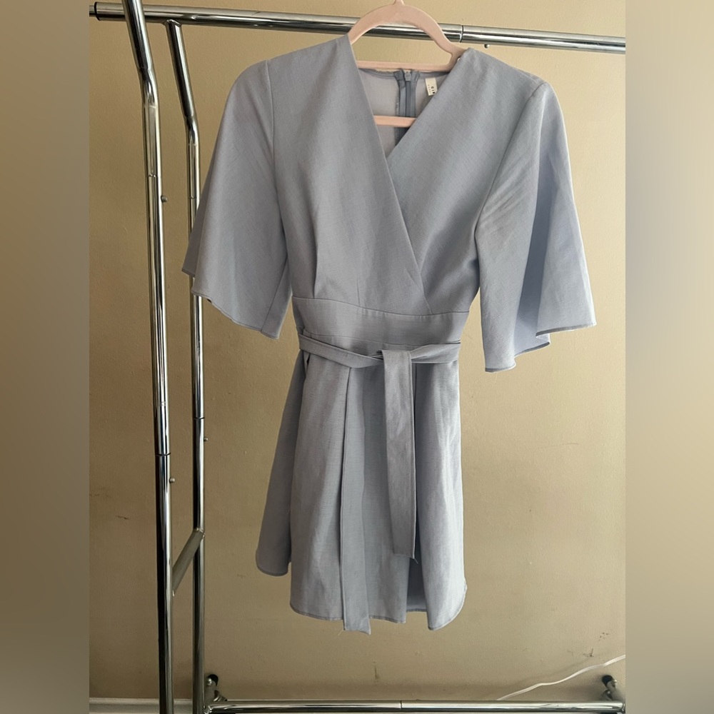 A romper dress that is from South Korea. The romper has been worn 2 or 3 times.